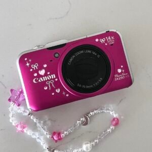 Canon PowerShot SX230 HS digital camera. This bright pink camera is super rare & takes super blingy photos!