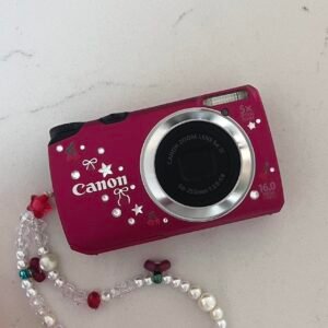 Canon Powershot A3300 IS digital camera. This little cherry red digicam has custom color filters & a bright flash - perfect for trips or a night out!˚ ༘🍒♡ ⋆｡˚